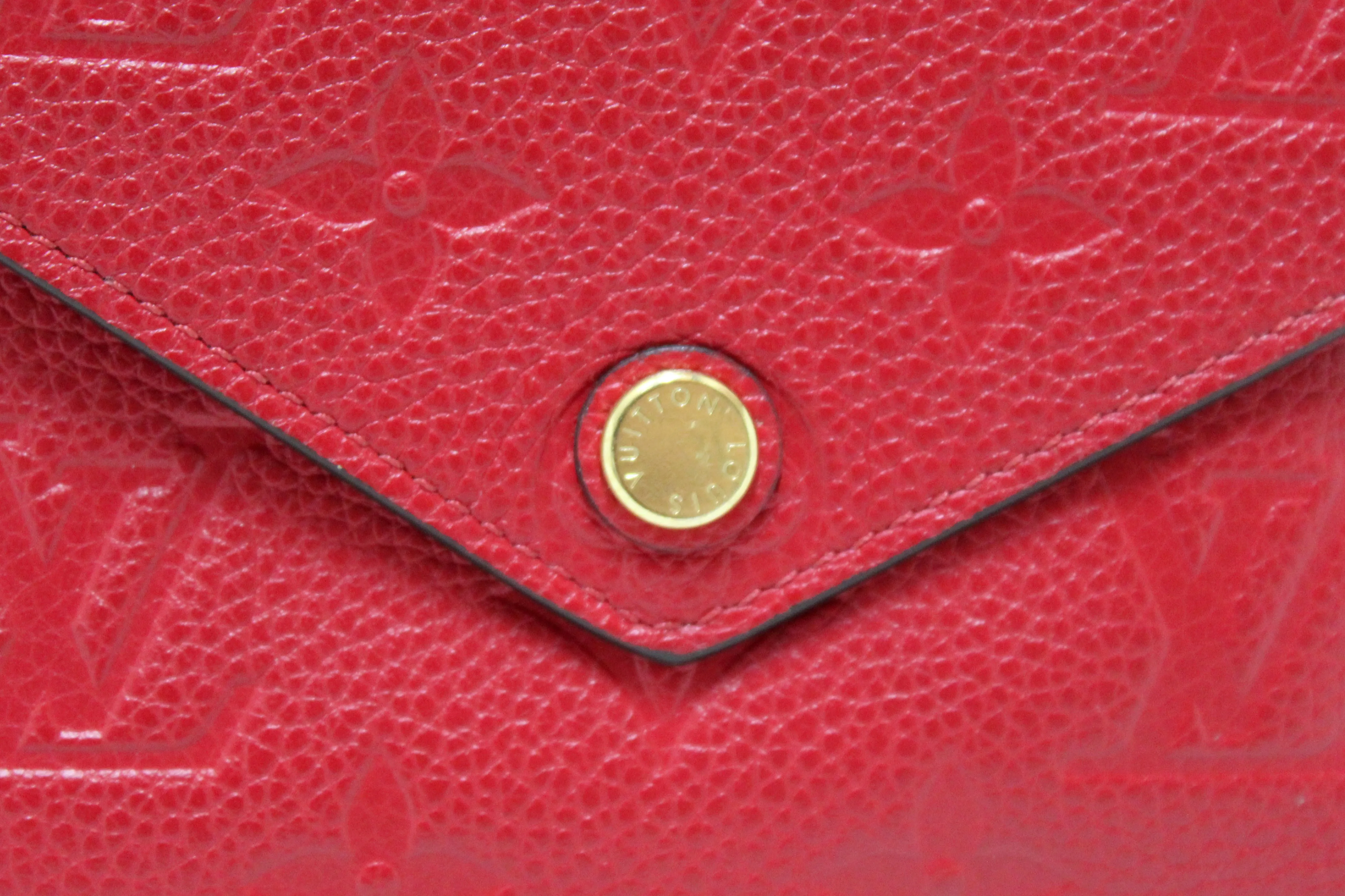 Authentic Louis Vuitton Red Monogram Empreinte Leather Victorine Wallet