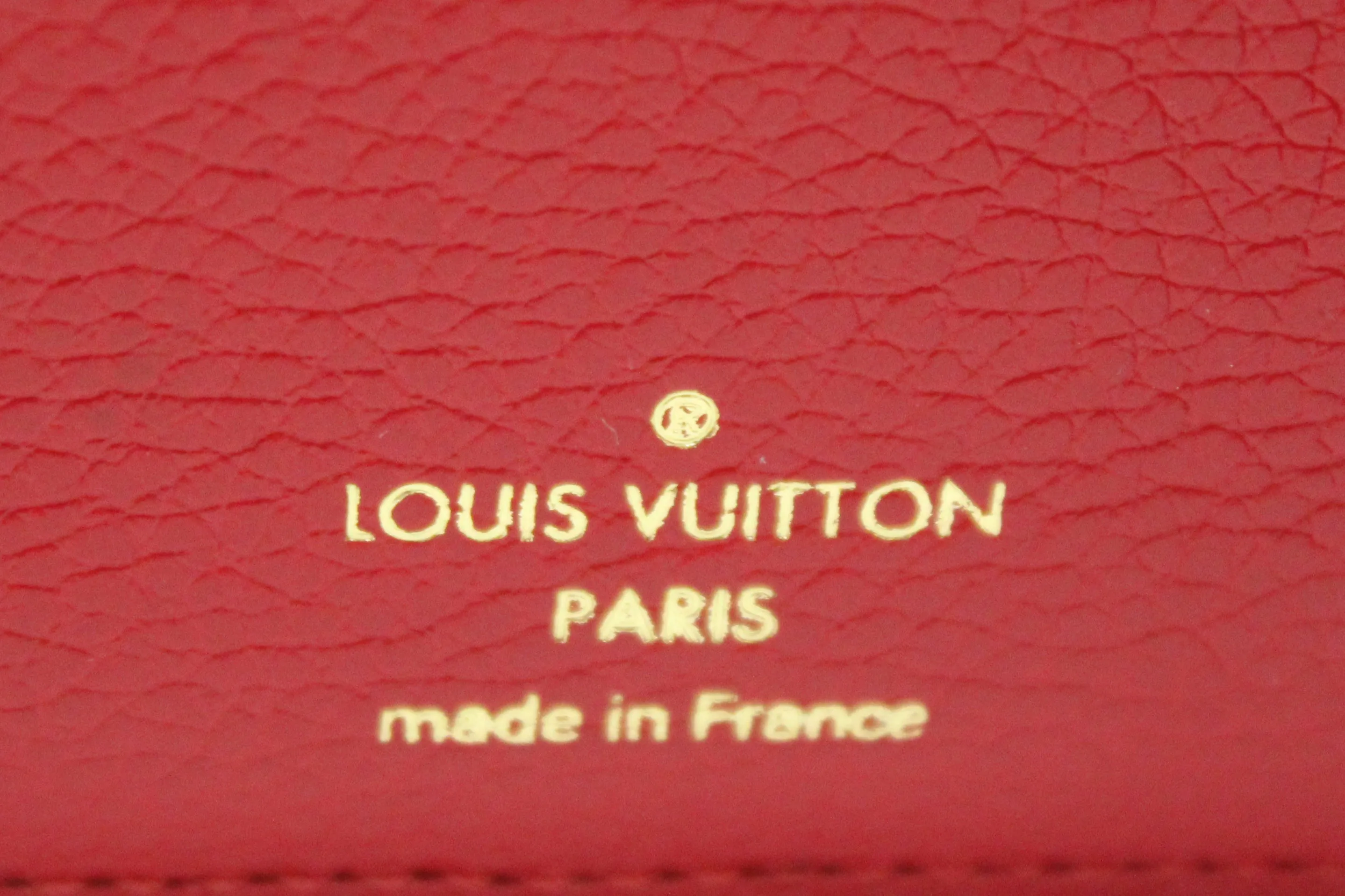 Authentic Louis Vuitton Red Monogram Empreinte Leather Victorine Wallet