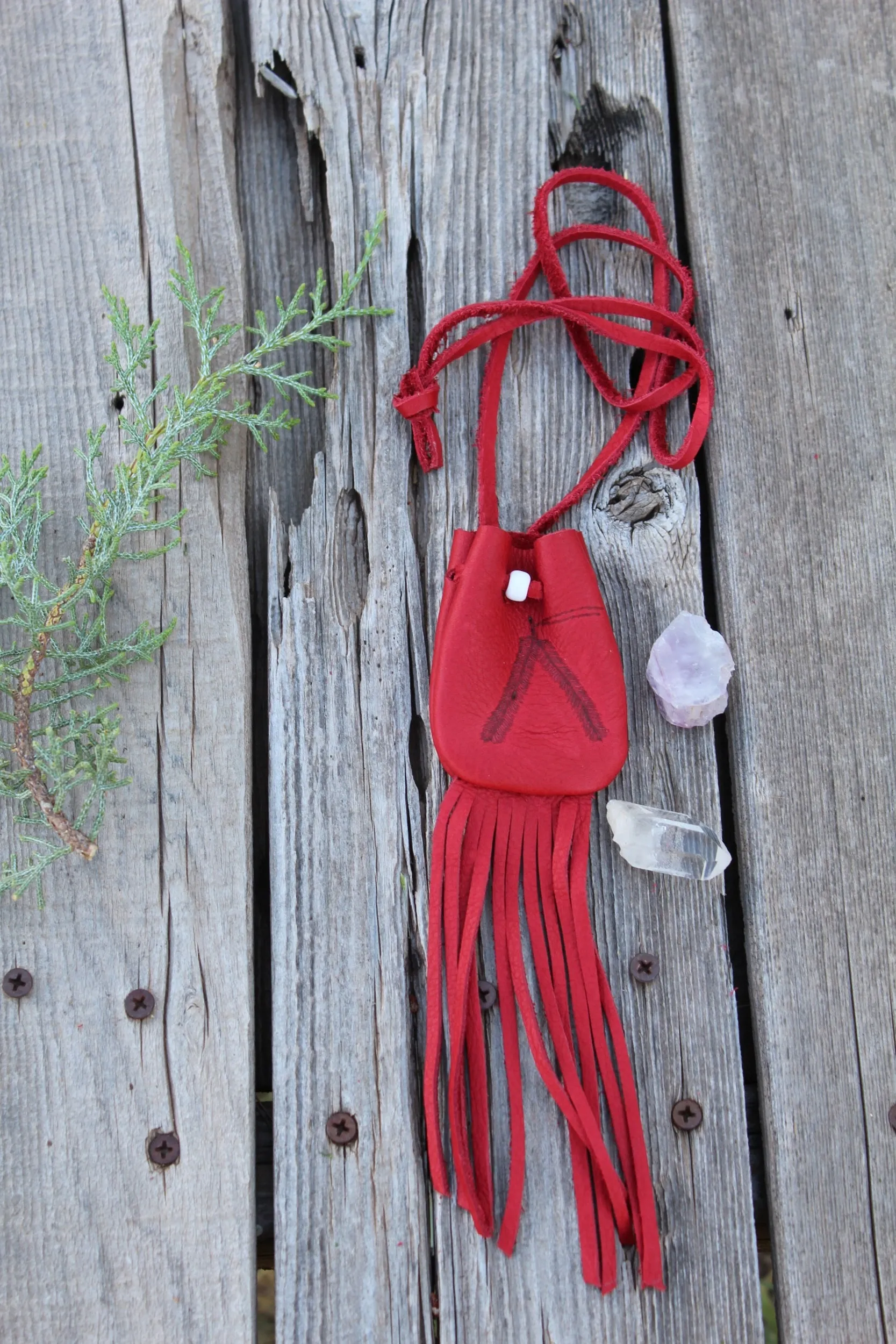 Fringed red leather medicine bag, red leather bag