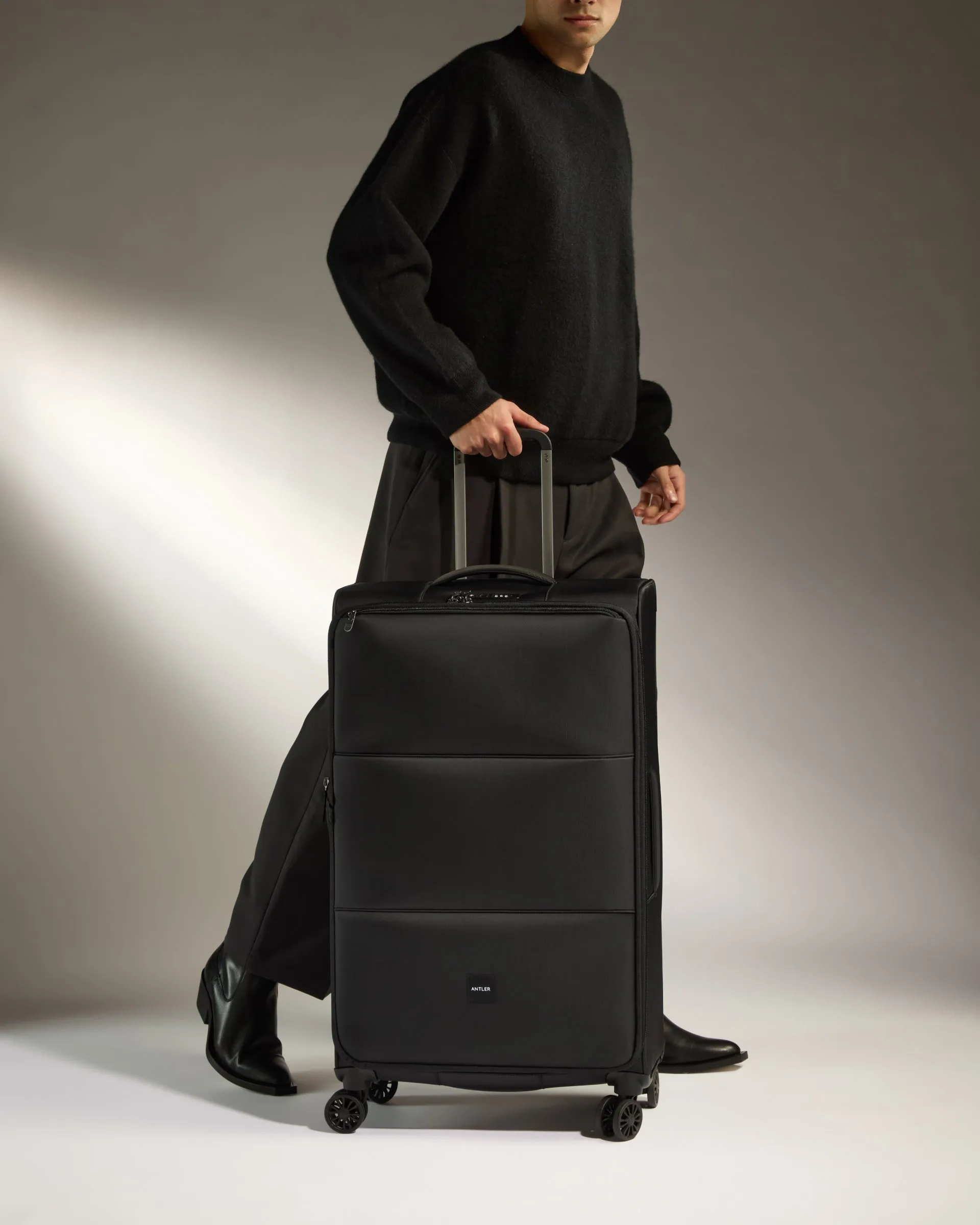 Lightest Large Suitcase in Black - Soft Stripe