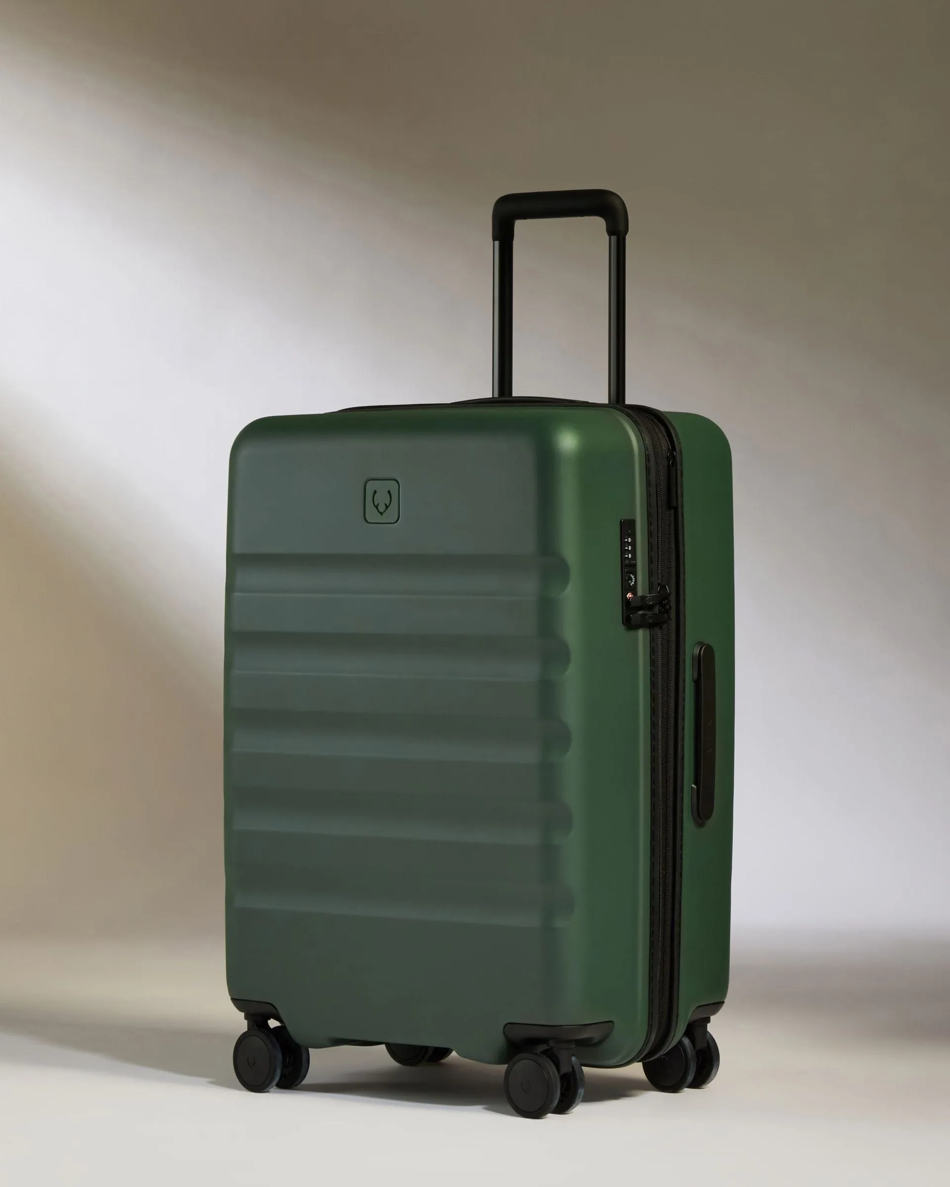 Medium Suitcase in Antler Green - Icon Stripe